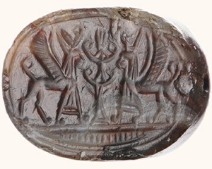Gem or scaraboid (jasper) with carved image of winged sphinxes flanking a sacred tree (RMO inv. no. GS-00007)
